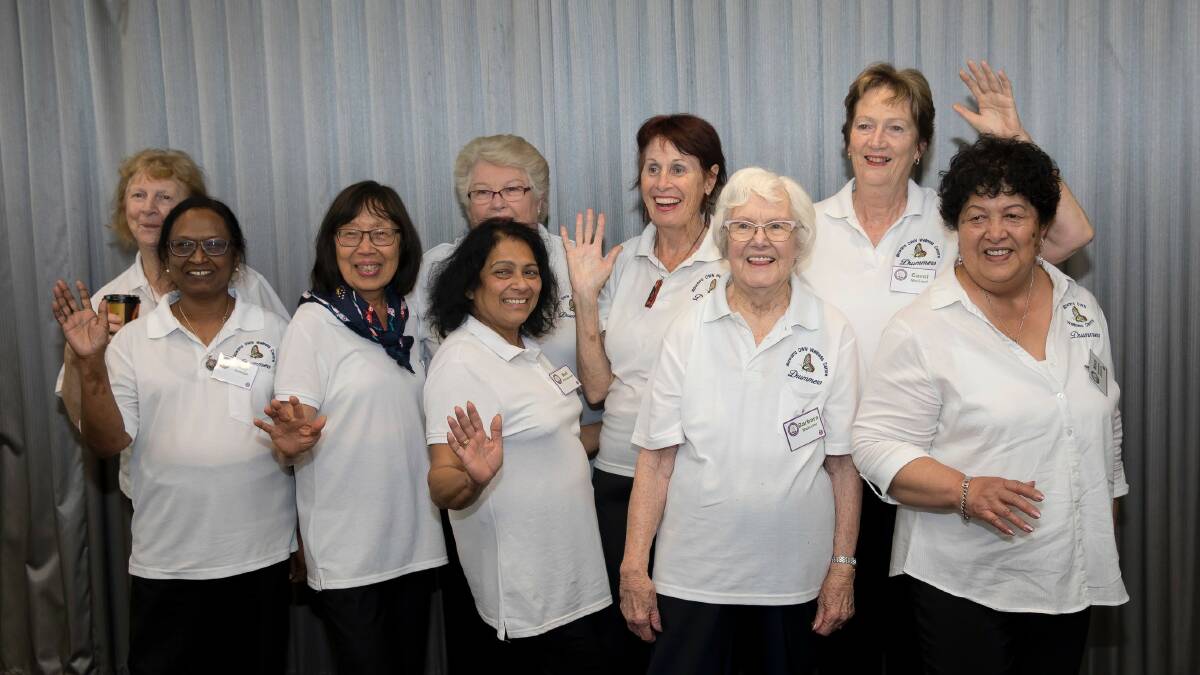 Beating their own drum: The Illawarra OWN Wellness Centre's drumming group during a recent visit to Brisbane.