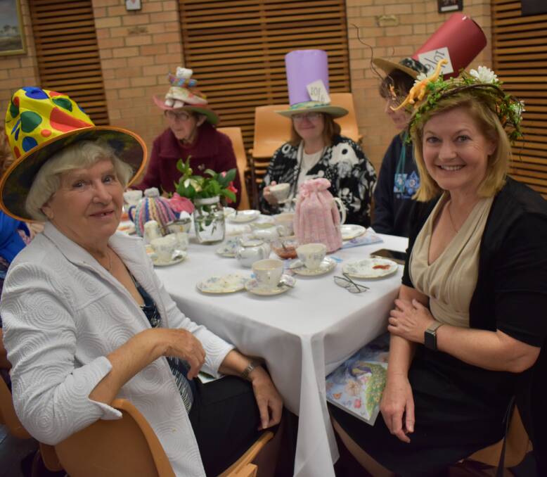Mad Hatters Tea Party: Corrimal Rotary Club members and guests got their heads together recently to raise funds for girls' education in Third World countries.