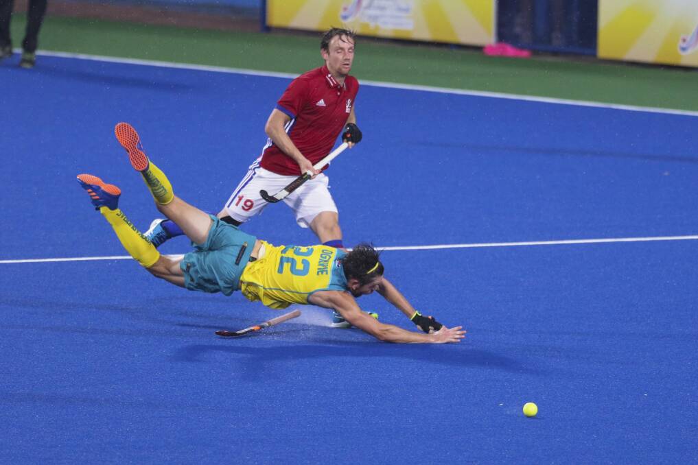 Back in green and gold: Australia's Flynn Ogilvie in the thick of the action during the Sultan Azlan Shah Cup tournament in Malaysia last year.
