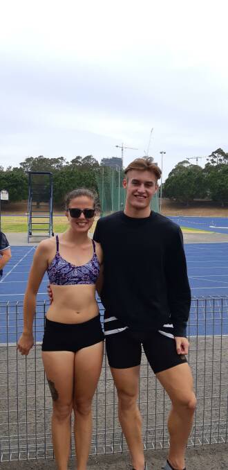 Good luck: Jonty Faulkner wishes senior athlete Sarah de Vries all the best in her coming state titles, after a successful youth titles for Jonty.