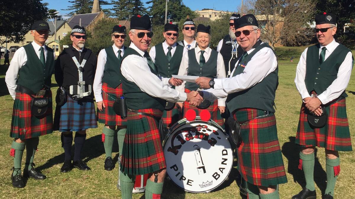 Historic links: The “Red Ulster” tartan worn by Kiama Pipe Band maintains the link between Kiama and the early pioneers of the district who came from Ireland.