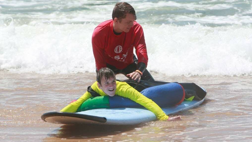 Blake Picton volunteering with the Disabled Surfers Association (DSA) South Coast Branch.