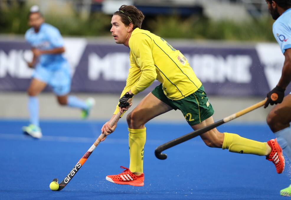 Australian hockey player Flynn Ogilvie playing against India at the Commonwealth Games.