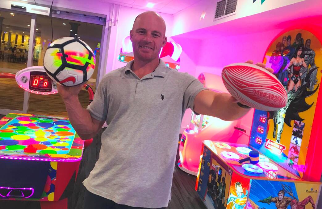 RENOVATION: Former rugby league international Beau Scott inside The Fraternity Club's new kids games room