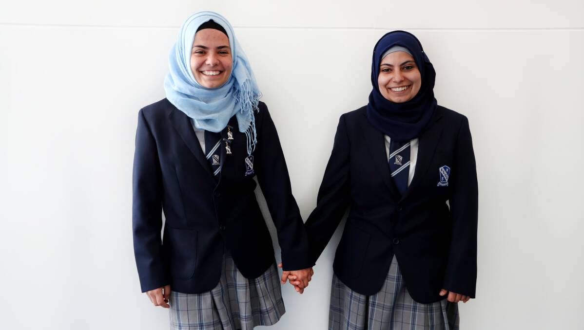 SCHOLARSHIP RECIPIENTS: Keira High School sisters Sara and Aya Al Arnoos have been awarded Friends of Zainab Senior Secondary Scholarships. Picture: Sylvia Liber.