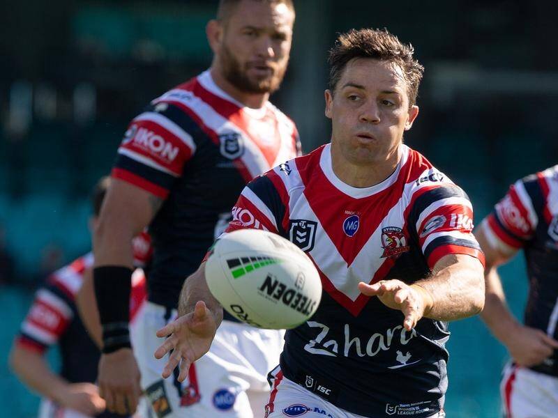 Roosters star Cooper Cronk was forced off against the Warriors with a shoulder injury.