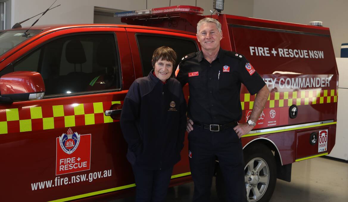 Office of the Year in a Paid Capacity: Rotary Club of Wollongong member and RESCA committee chairperson Dot Hennessy with Superintendent Tony Waller at Wollongong Fire Station. Picture: Sylvia Liber