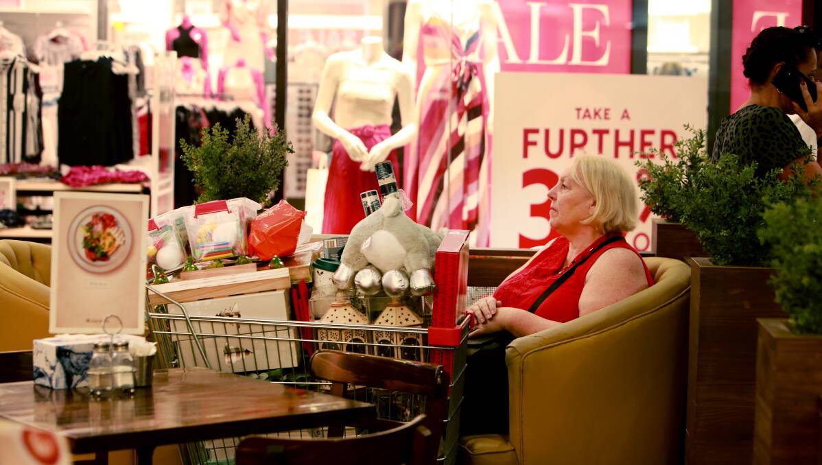 Santa Sandra: Sandra White rests with a coffee after two hours of Boxing Day Shopping ahead of hosting a lunch for 27 people. Pictures: Sylvia Liber.