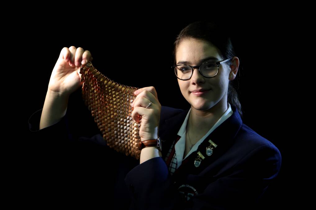 Inspirational speaker: NSW Young Australian of the Year Macinley Butson with her SMART Armour innovation for women unedegoing radiation therapy. Pic: Sylvia Liber.
