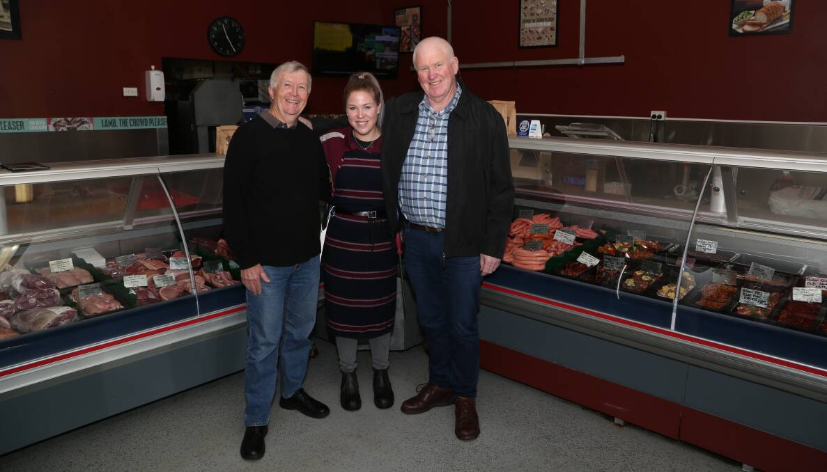 Butchery business notches up 70 years: Chris, Samantha and Patrick Dorahy at Dorahy Meats Unanderra. Picture: Greg Ellis.
