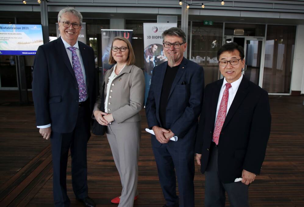 Major showcase: Vice-chancellor Paul Wellings, deputy vice chancellor research and innovation Jennifer Martin, Prof Gordon Wallace and ISBF president James Yoo. Picture: Greg Ellis. 