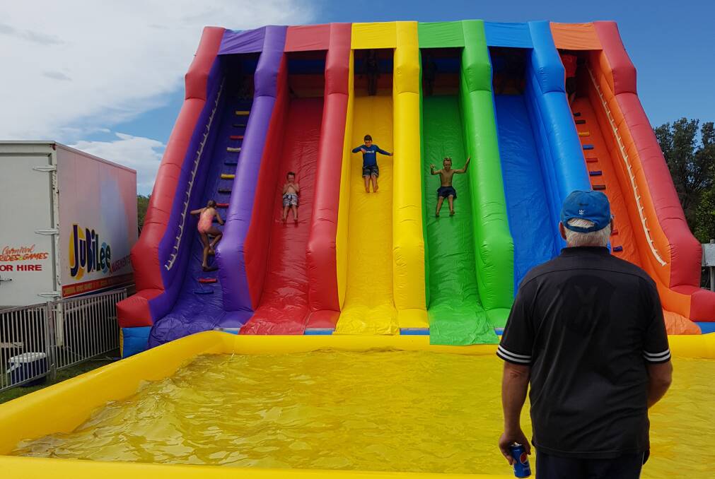 Cool fun in the sun: Despite the wind Inflatable fun at Reddall Reserve at Lake Illawarra on Saturday. Picture: Shellharbour City Council.
 