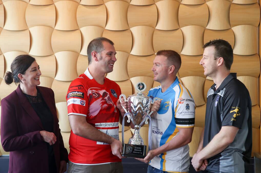 Match up for lost mates: Kerri Donnelly with Wollongong Command's Dan OLeary and Lake Illawarra Command's Andrew Atkins and Brad Deanat at the launch of the Graeme Donnelly Cup. Picture: Adam McLean 