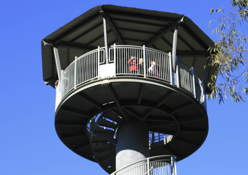 Up where we belong: Knights Tower has provided a unique vantage point above the Illawarra Escarpment overlooking Albion Park now for one decade. Pic: Greg Ellis.
