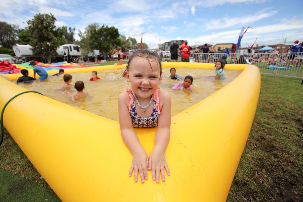 Wet n' Mild: Dulcie Napper, 4, enjoys a cool splash in the pool at Reddall Reserve in Lake Illawarra on Saturday. Picture: Adam McLean

