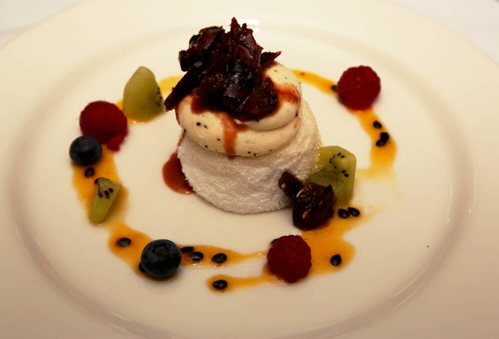 Sweets with a native food flavour: Mini pavlova served with wattle seed cream and quandong confit for dessert at the Novotel Wollongong Northbeach. Pictures: Greg Ellis.
