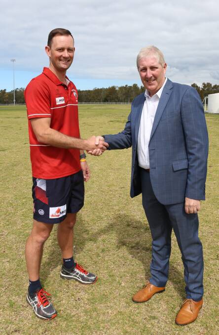 Football fever: Wollongong Touch Association vice president Tim Robinson  with NSW Touch Association general manager Dean Russell at Thomas Dalton Park.